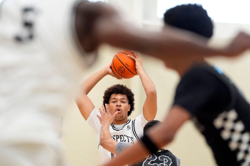 July 16, 2025; North Augusta, South Carolina, USA; Utah Prospects Jamyn Sondrup (14) looks to pass during the Team Durant and Utah Prospects game at the Nike EYBL Peach Jam at Riverview Park Activities Center. Team Durant won 82-74.