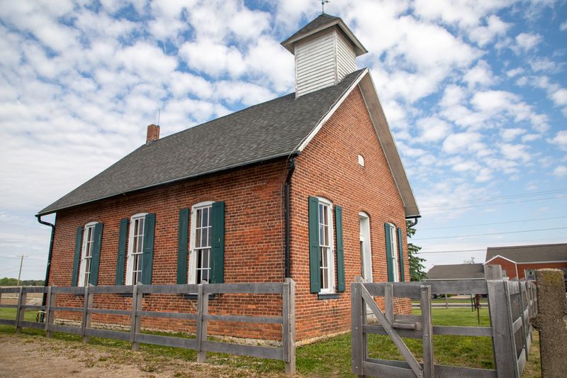By 1874, the District 3 schoolhouse had moved to its current location. The wood-frame building that stood there was replaced a year later by the brick one that still stands today, built in 1875.