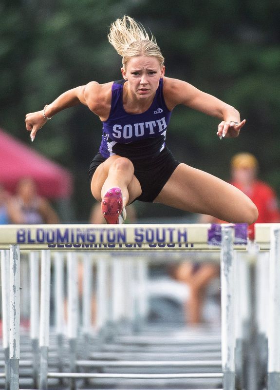 South's Adriene Shaevitz competes in the 100 meter hurdles during the IHSAA girl's sectional track meet at Bloomington High School South on Tuesday, May 19, 2026.