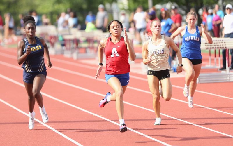 South Bend Adams sophomore Jaidyn Kimbrough (middle left) wins the IHSAA girls track and field sectional prelims in the 100-meter dash Tuesday, May 19, 2026, at Mishawaka High School