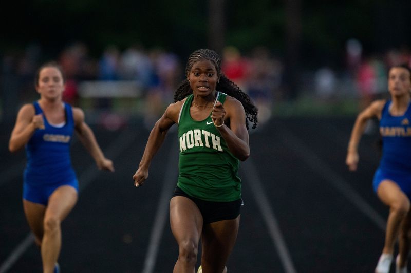 North sprinter De'Janay Layne set a regional meet record in the 100-meter dash at 11.86 seconds during the IHSAA regional at Central High School.