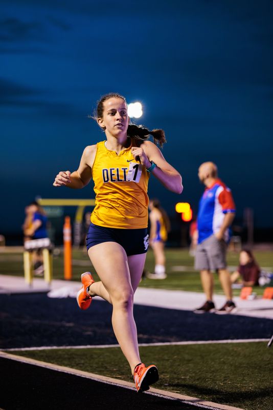 Delta sophomore Shiloh Bunch finishes first in the 1600m run at the IHSAA Girls Track and Field Sectionals at Delta High School on May 19, 2026.