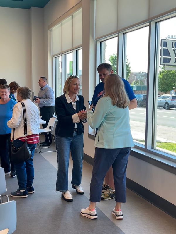 Heidi Beidinger speaks with attendees after a St. Joseph County Democrats caucus on Wednesday, May 20, 2026, at the Howard Park Event Center in South Bend.