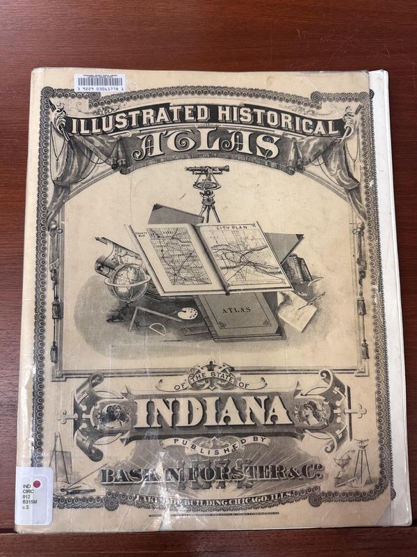 An atlas sits on display in the Lafayette Public Library's The Swezey Room of Indiana History.