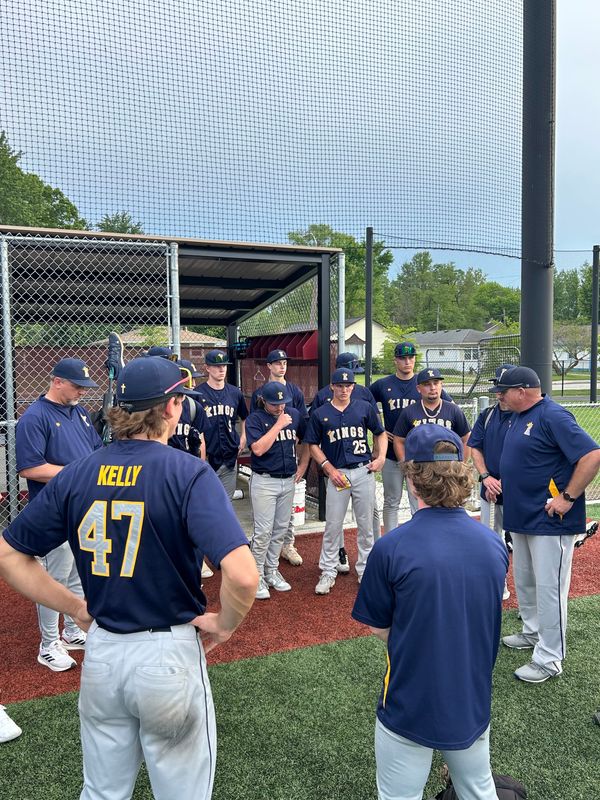 Indianapolis Kings coach Jeff Jenkins (far right) addresses his team after its game against Lafayette Central Catholic at Scecina.