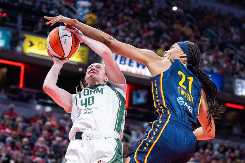 The Indiana Fever signed rookie Grace VanSlooten, left, to a full-year contract Friday. She was a third-round WNBA draft pick in April out of Michigan State.
