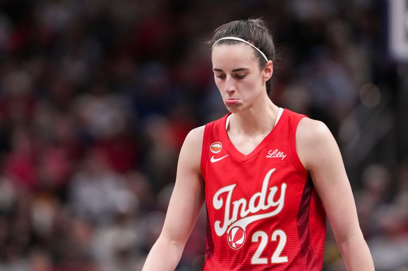 Indiana Fever guard Caitlin Clark (22) reacts after missing a basket Friday, May 22, 2026, during the first half of a game against the Golden State Valkyries at Gainbridge Fieldhouse in Indianapolis.