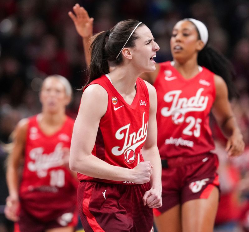 Indiana Fever guard Caitlin Clark (22) celebrates Friday, May 22, 2026, during the first half of a game against the Golden State Valkyries at Gainbridge Fieldhouse in Indianapolis.