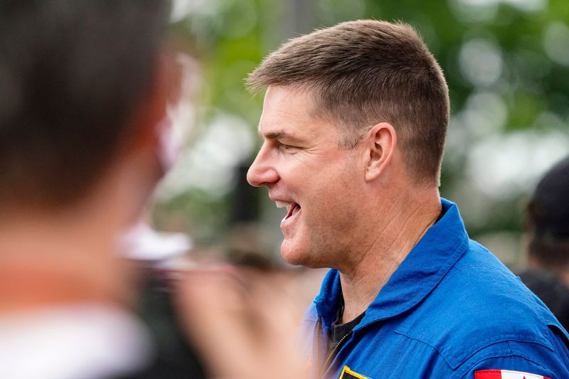 Jeremy Hansen, astronaut and Artemis II crew member, walks the celebrity red carpet on Sunday, May 24, 2026, during the 110th running of the Indianapolis 500 at Indianapolis Motor Speedway.