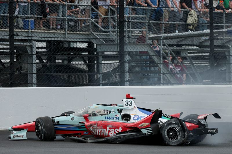 Ed Carpenter Racing driver Ed Carpenter (33) crashes in the exit of the first turn Sunday, May 24, 2026, during the 110th running of the Indianapolis 500 at Indianapolis Motor Speedway.