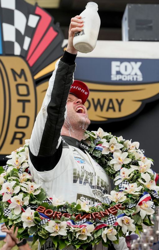 Meyer Shank Racing with Curb Agajanian driver Felix Rosenqvist (60) celebrates with milk Sunday, May 24, 2026, after winning the 110th running of the Indianapolis 500 at Indianapolis Motor Speedway.