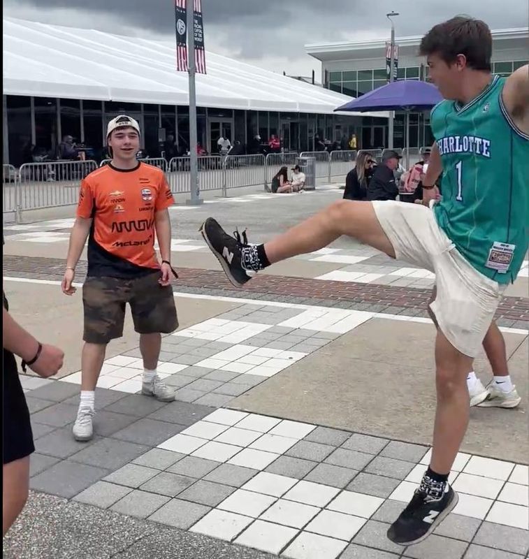 Indy 500 fans play hacky sack at the Indianapolis Motor Speedway on Sunday, May 24, 2026, during a rain delay. (Miah Thurow / IndyStar)