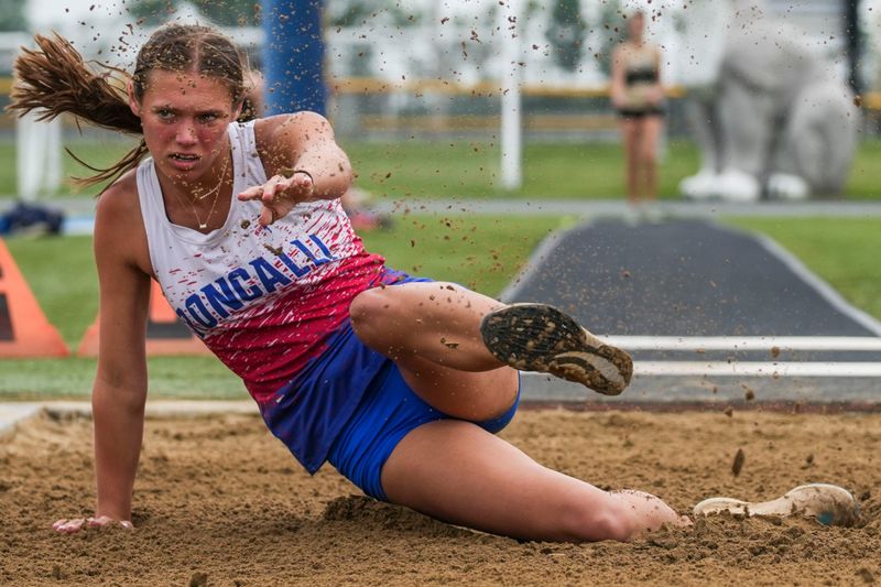 Roncalli’s Becca Engel jumps Tuesday, May 26, 2026, during an IHSAA regionals girls track and field meet at Greenfield-Central High School in Greenfield. Engel finished in 10th place in long jump.