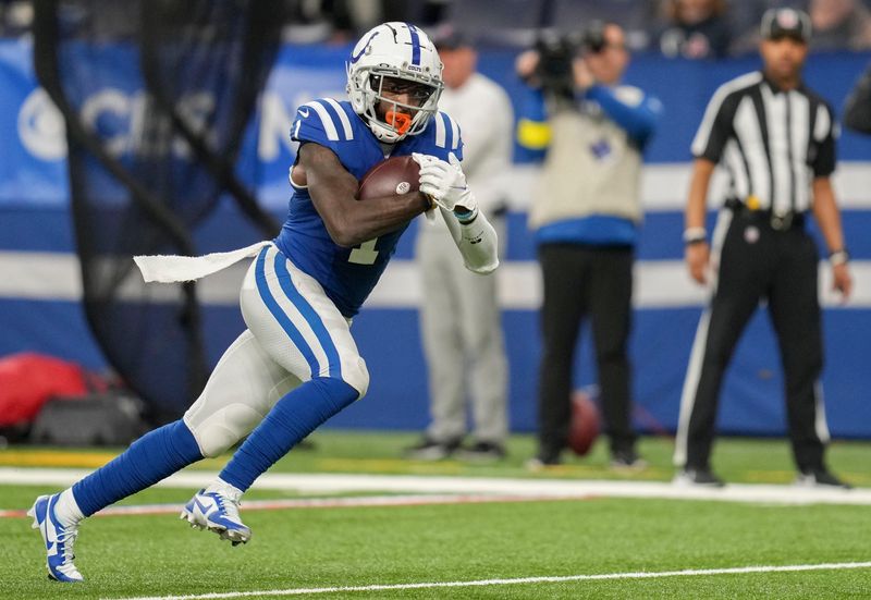 Indianapolis Colts wide receiver Parris Campbell (1) rushes the ball after making a long reception Sunday, Jan. 8, 2023, during a game against the Houston Texans at Lucas Oil Stadium in Indianapolis.