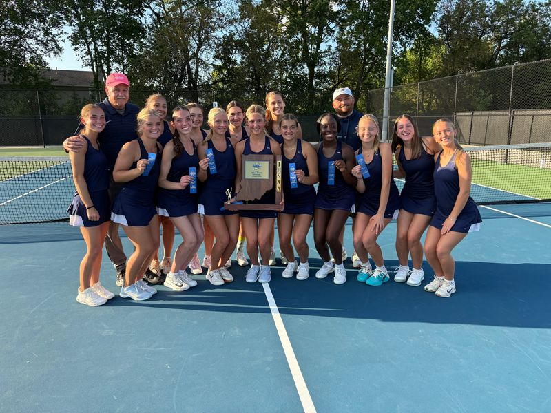 Delta girls tennis celebrates with the IHSAA regional trophy after defeating Westfield 4-1 in a regional championship match at the Noblesville Tennis Complex on Wednesday, May 27, 2026.