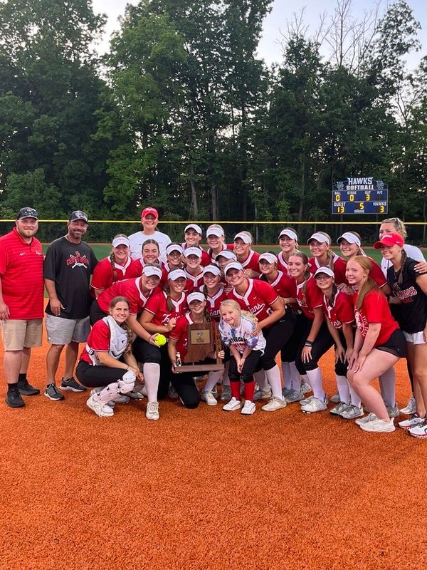 IHSAA Softball; The Center Grove Trojans celebrate with their Sectional championship trophy after defeating the Mooresville Pioneers on May 27th.