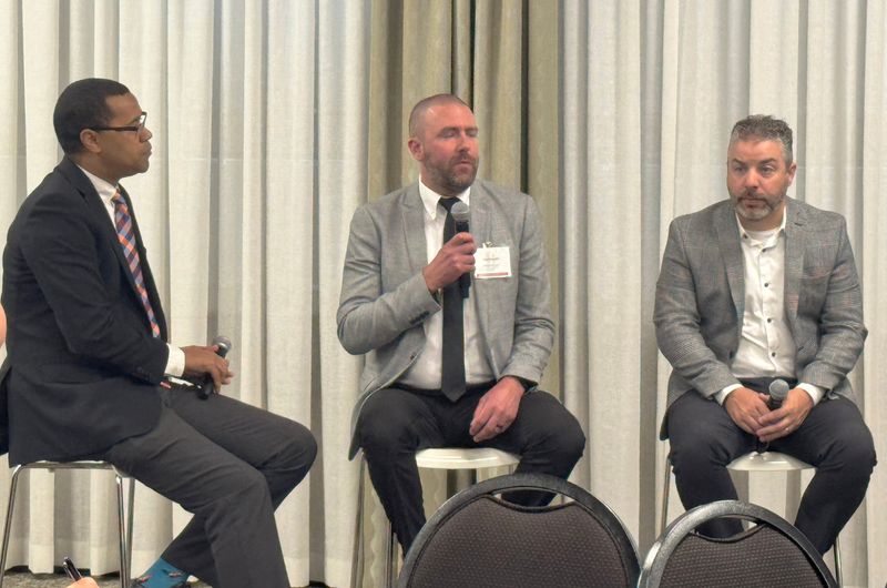 Bloomington Economic Development Corp. May board meeting panelists are, center, Tim Pritchett (Matrix Integration) and Rob Nugent (Hylant Insurance),right, moderated by Isak Asare (Indiana University's Hamilton Lugar School of Global and International Studies), left. The panel discussed practical cybersecurity steps for Monroe County businesses and organizations.
