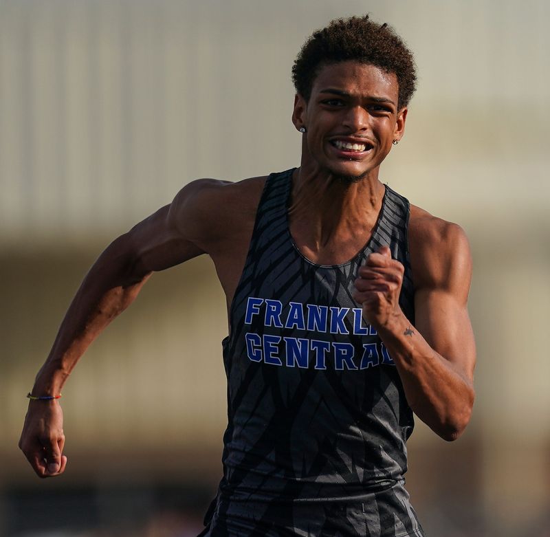 Franklin Central's Rylan Hainje competes in the 110 high hurdles on Thursday, May 28, 2026, during the IHSAA boys track and field regional at Greenfield High School in Greenfield.