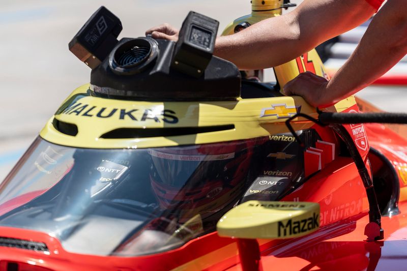 An IndyCar race car driver is seen in pit lane during the NTT IndyCar Series Practice 1 at the Chevrolet Detroit Grand Prix presented by Lear in Detroit on Friday, May 29, 2026