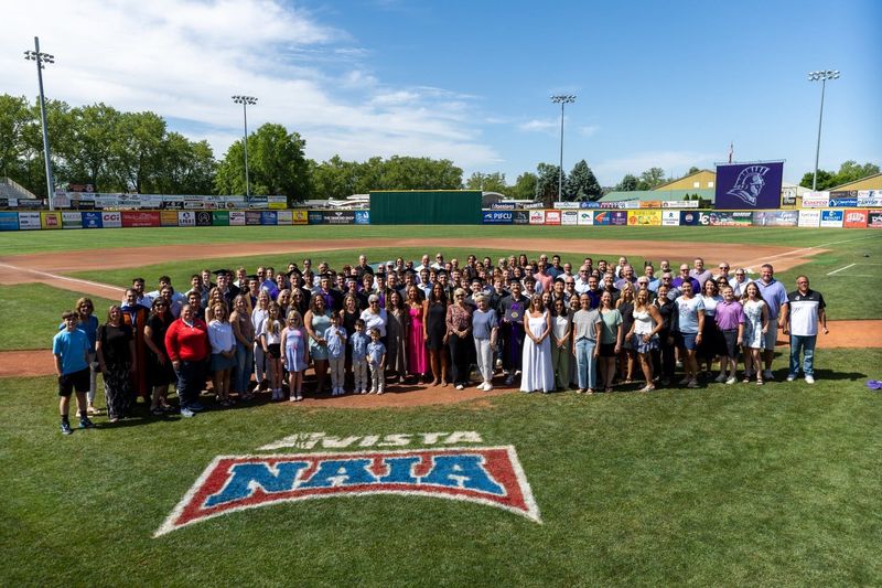 One day after a traditional commencement in Upland, Taylor University took graduation to its baseball team competing at the NAIA World Series in Lewiston, Idaho.