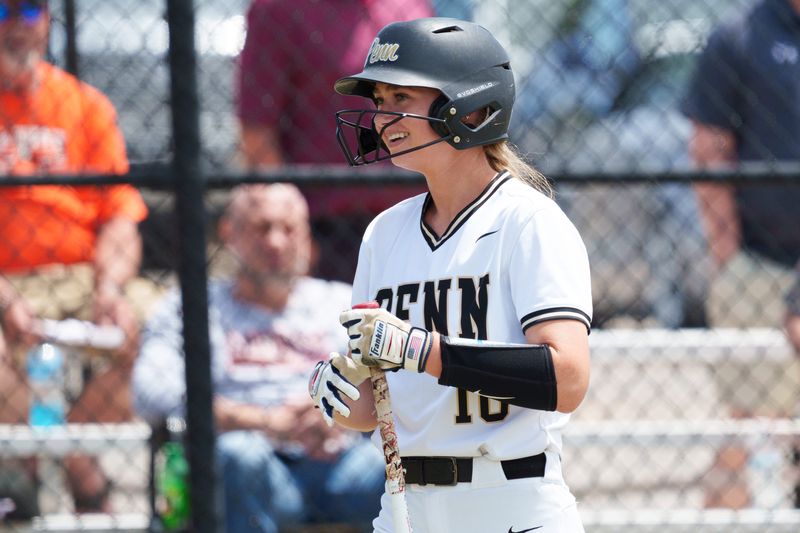 Penn's Logan Rumble celebrates after scoring a run during an IHSAA softball sectional championship game between Penn and LaPorte at Penn High School Saturday, May 30, 2026, in Mishawaka.