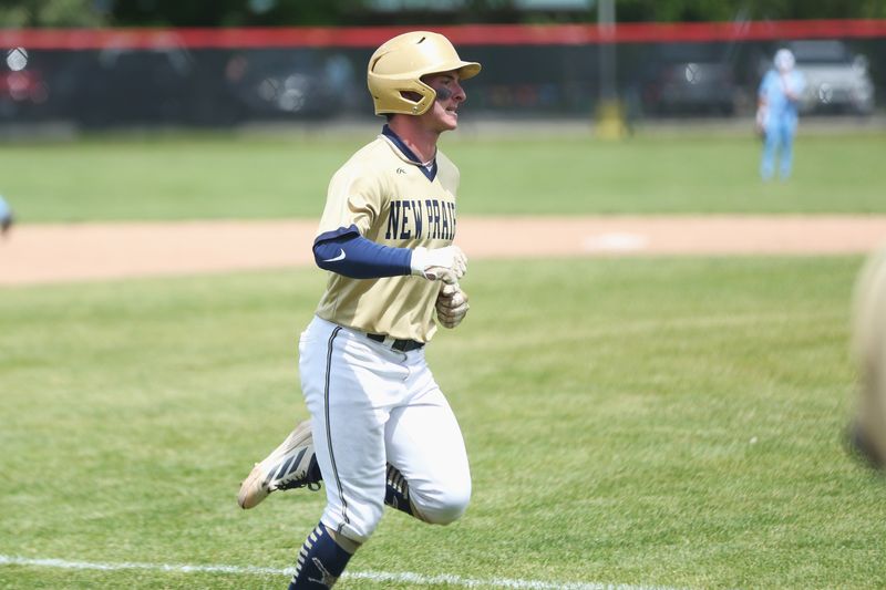 New Prairie senior Reed Robinson pumps his right fist as he rounds third base after hitting a home run in an IHSAA Class 3A sectional semifinal game Saturday, May 30, 2026, at Bill Nixon Field in Plymouth.