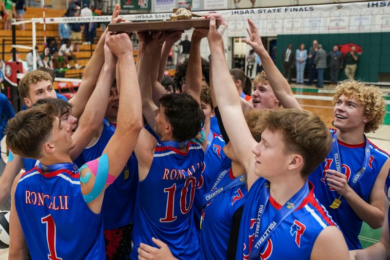 The Roncalli Royals celebrate Saturday, May 30, 2026, after winning the IHSAA boys volleyball state finals at Lawrence North High School in Indianapolis. The Roncalli Royals defeated the Cathedral Fighting Irish in three sets.