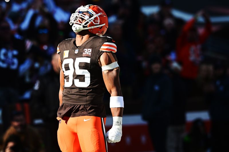 Cleveland Browns defensive end Myles Garrett (95) celebrates after sacking Pittsburgh Steelers quarterback Kenny Pickett (not pictured) during the first quarter at Cleveland Browns Stadium on Nov. 19, 2023