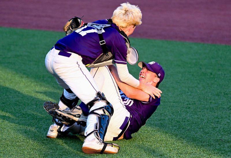 Bloomington South’s Jake McCammon (17) celebrates with Connor Couch after defeating Bloomington North in the sectional championship game at South on Monday, June 1, 2026.