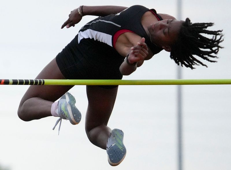 Kira Smith jumps during an IHSAA regionals girls track and field meet on Tuesday, May 26, 2026, at Greenfield-Central High School.