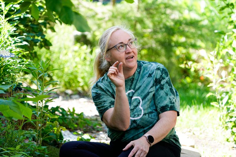 Bobby Jean Avery-Kimball, president of the native plant society, give a garden tour to IndyStar on Tuesday, June 2, 2026, in Westfield, Ind. Kimball has replaced her yard with plants native to Ind.