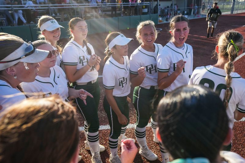 The Pendleton Heights Arabians huddle up Tuesday, June 2, 2026, after winning a regional championship matchup at Lawrence North High School in Indianapolis. The Pendleton Heights Arabians defeated the Lawrence North Wildcats, 10-0, in five innings.