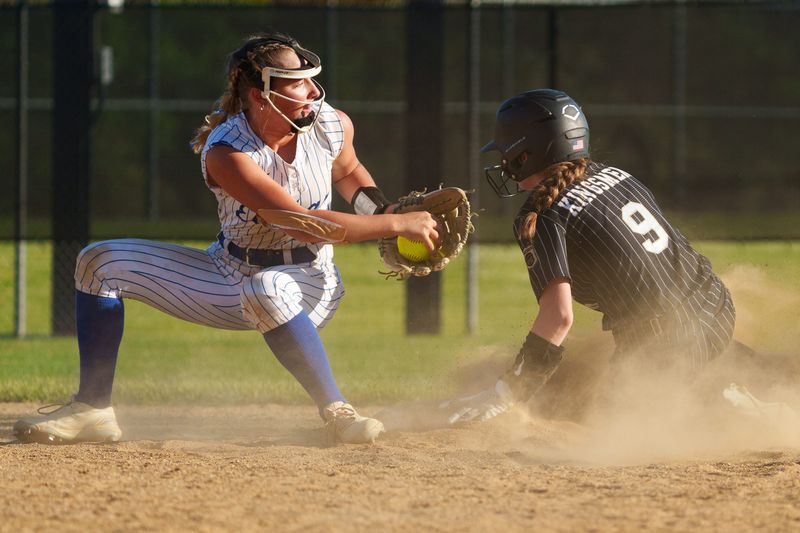 Penn's Carson Petty (9) slides safely into second during an IHSAA regional softball championship game between Penn and Elkhart at Elkhart High School Tuesday, June 2, 2026, in Elkhart.