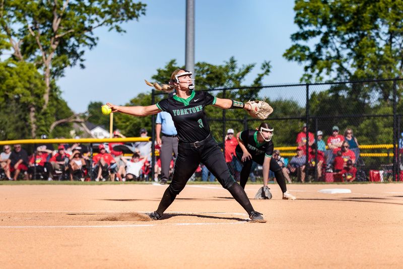 Yorktown sophomore Liv Jones (9) pitches at the IHSAA Girls Softball Regional #12 at Yorktown High School.