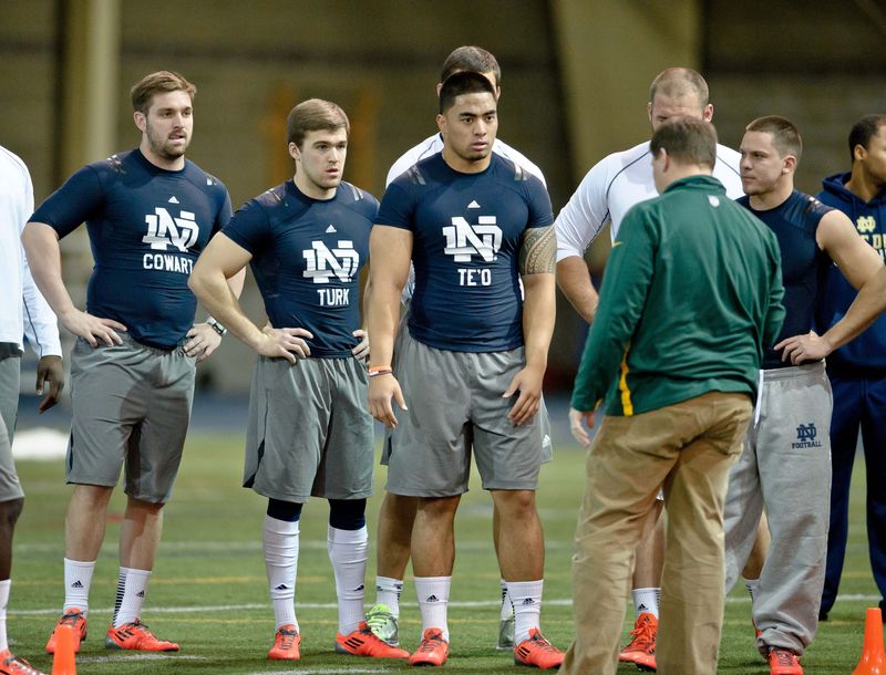 Mar 26, 2013; South Bend, IN, USA; Notre Dame Fighting Irish former players Jordan Cowart , Ben Turk , Manti Te'o and Robby Toma listen to instructions during Notre Dame pro day at the Loftus Center. Mandatory Credit: Matt Cashore-USA TODAY Sports
