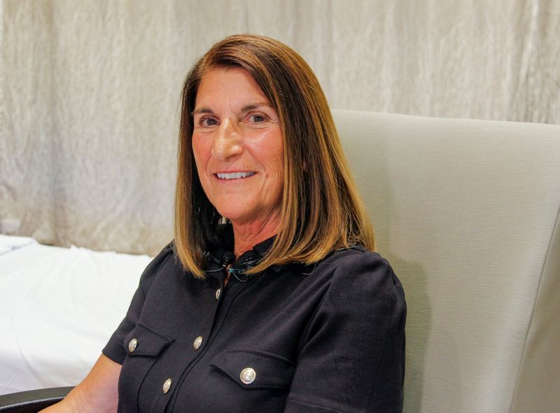 Diane Krill, Beacon Hospital patient and Beacon Health Foundation board member, poses for a photo inside Beacon Hospital in Granger on June 2, 2026. Krill said the 10 years of collaboration between Beacon Health System and Mayo Clinic Care Network has changed her life.