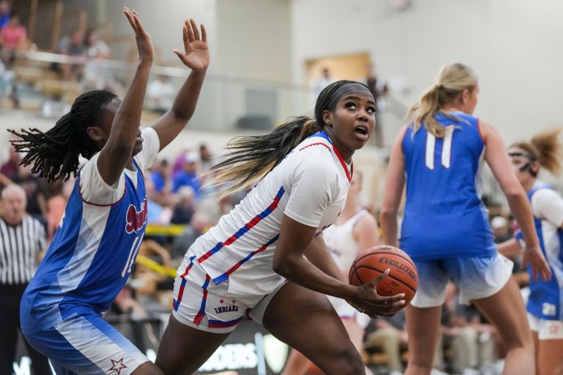 Junior All-Star Kyle Patterson (14) guards Senior All-Star Lola Lampley (2) on Wednesday, June 3, 2026, during a game between the Indiana All-Stars and the Junior All-Stars at Mt. Vernon High School in Fortville, Ind.