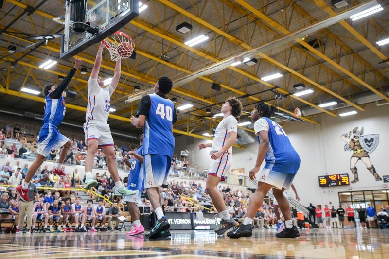Senior All-Star Brady Scholl dunks the ball Wednesday, June 3, 2026, during a game between the Indiana All-Stars and the Junior All-Stars at Mt. Vernon High School in Fortville, Ind.
