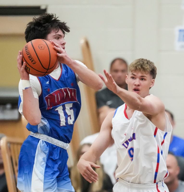 Senior All-Star Evan Harrell (9) guards Junior All-Star Brandon Hunter (15) on Wednesday, June 3, 2026, during a game between the Indiana All-Stars and the Junior All-Stars at Mt. Vernon High School in Fortville, Ind.
