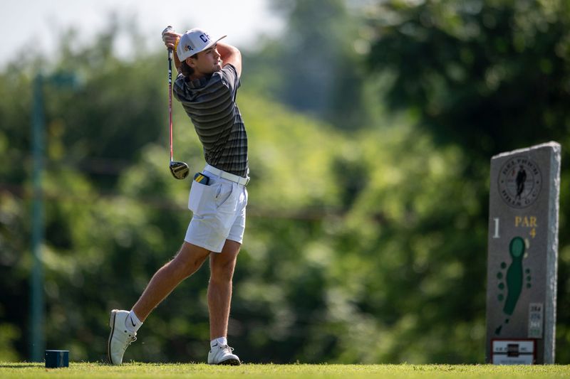 Castle's Alexander Cook tees off during the 2026 IHSAA Boys Golf Sectional at Helfrich Hills Thursday, June 4, 2026.