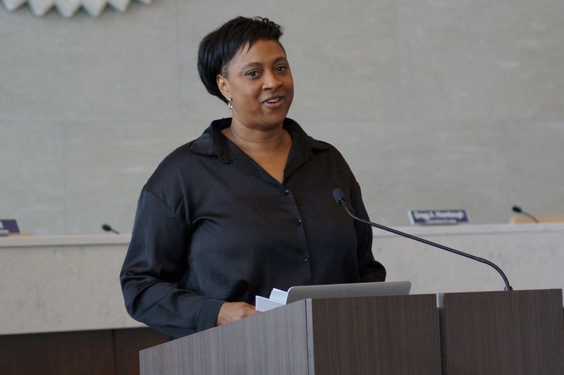 Monica Brazier owner of Monica Brazier Photography speaks about how companies utilize artificial intelligence for marketing and day-to-day operations during the South Bend Human Rights Commission Fair Housing in the Age of AI and Algorithms event Thursday, June 4, 2026.