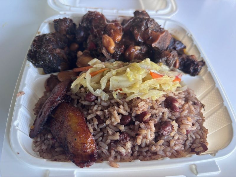 "J.D.'s famous oxtails" with butter beans, sweet plantains, rice and peas and steamed cabbage are among the offerings at Yaso Jamaican Grill, 1501 Prospect St. May 29, 2026