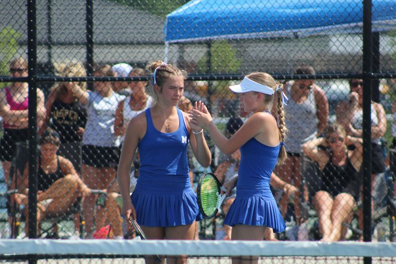 Evansville Memorial and Jasper faced off in an IHSAA girls tennis state semifinal match Friday, June 5, 2026, at North Central High School in Indianapolis. Memorial won to advance to the state finals.