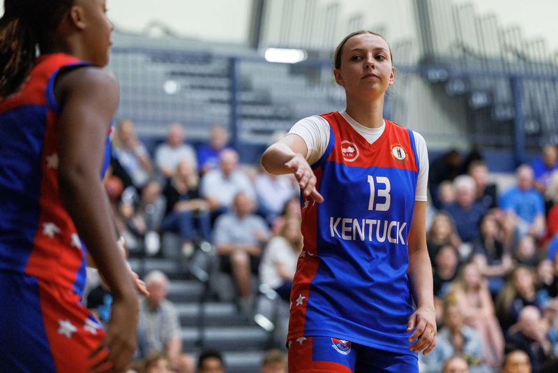 Kentucky's Cariann Williams fives Ashlinn James during the Kentucky/Indiana All-Star Game at Lexington Catholic High School on Friday, June 5, 2026.