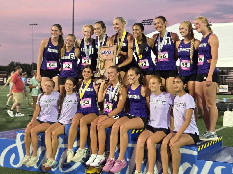 Members of the Bloomington South girls track team pose with the second place trophy after the IHSAA state finals at North Central High School in Indianapolis on Friday, June 5, 2026.