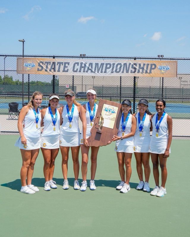 Carmel's girls' tennis team defeated Evansville Memorial 4-1 to win the state title on Saturday.