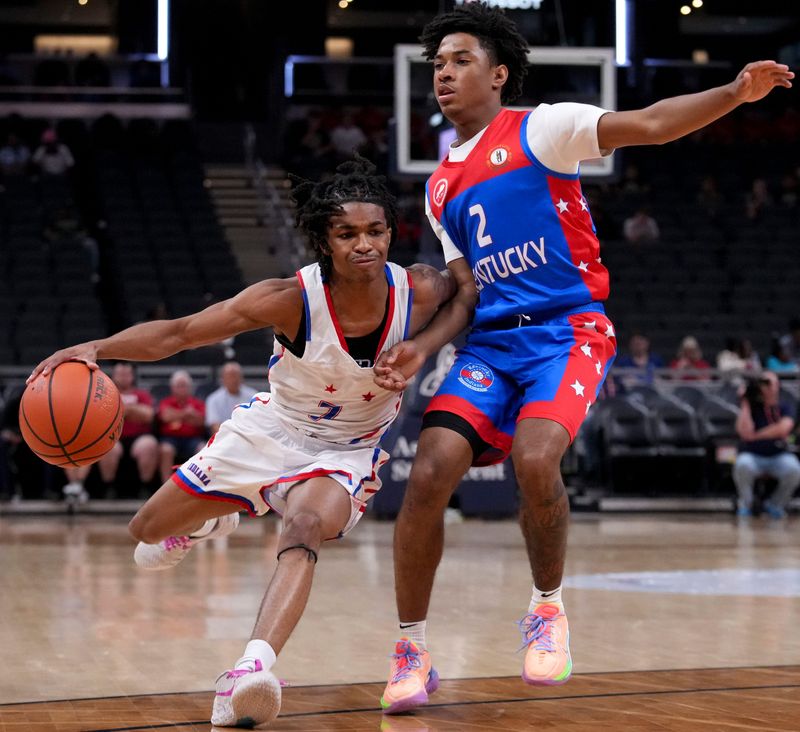 Indiana All-Stars' Cameron Webster (7) attempts to get past Kentucky All-Stars' Leek Ateny (2) on Saturday, June 6, 2026, during a game between the boy’s Indiana All-Stars and Kentucky All-Stars at Gainbridge Fieldhouse in Indianapolis. Indiana defeated Kentucky 94-80.