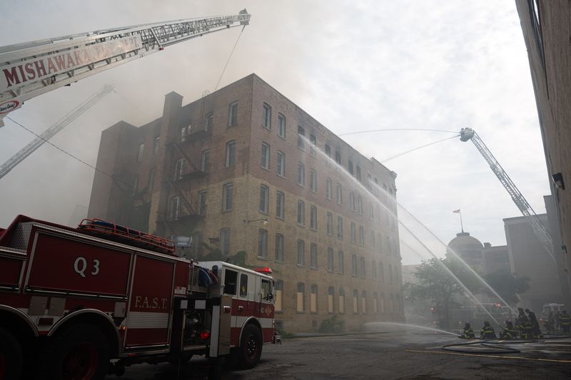 Firefighters work the scene of a fire at the Lafayette Building the morning of Monday, June 8, 2026, in downtown South Bend.
