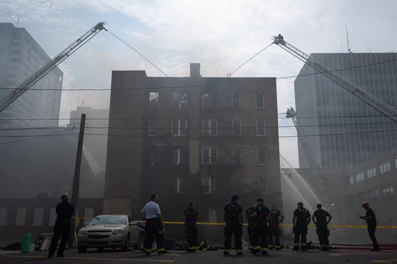Firefighters work the scene of a fire at the Lafayette Building the morning of Monday, June 8, 2026, in downtown South Bend.