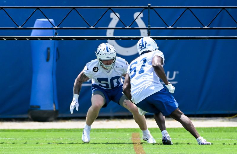 Jun 10, 2026; Indianapolis, IN, USA; Indianapolis Colts linebacker Bryce Boettcher (50) and Indianapolis Colts linebacker Jaylon Carlies (57) participate in a drill during minicamp at Indiana Farm Bureau Football Center. Mandatory Credit: Robert Goddin-Imagn Images